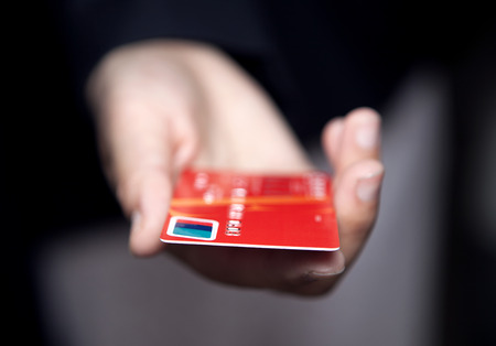 Hand holding credit cardのeditorial素材