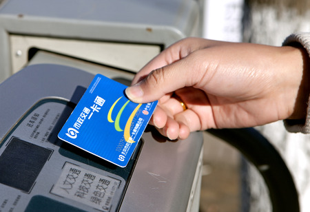 Swiping card for public bikeのeditorial素材