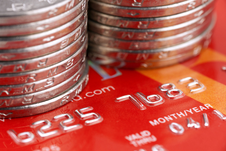 Chinese coins with credit cardのeditorial素材