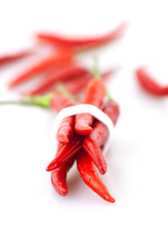 Chili peppers on white backgroundの写真素材