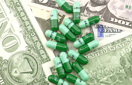 Capsule imported drugs on the dollar bill