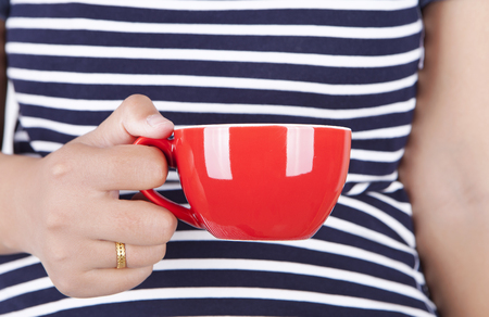 having a cup of coffeeの写真素材