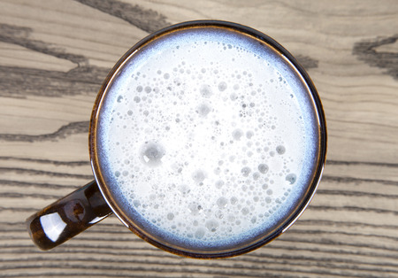 A beer with foamの写真素材