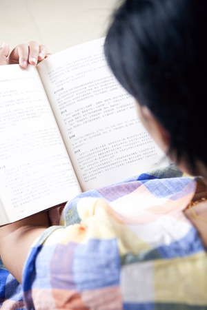 Girl reading bookのeditorial素材