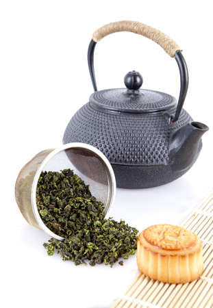 mooncake and chinese tea on white backgroundの写真素材