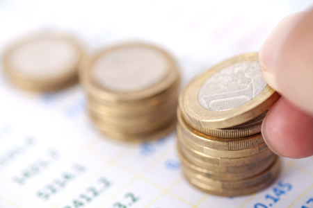 Euro coins in financial figuresの写真素材
