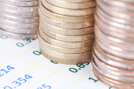 euro coins on the billの写真素材