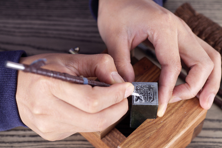 Close up view of carving a seal copのeditorial素材