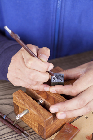 Close up view of carving a seal copのeditorial素材