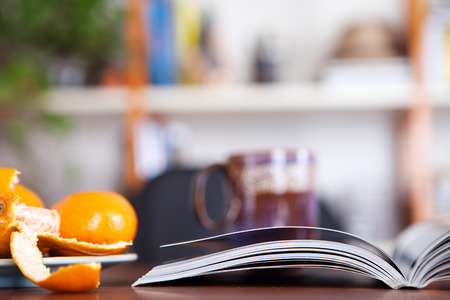 Books open to study on deskの写真素材