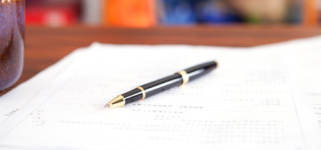 A pen on the documentの写真素材