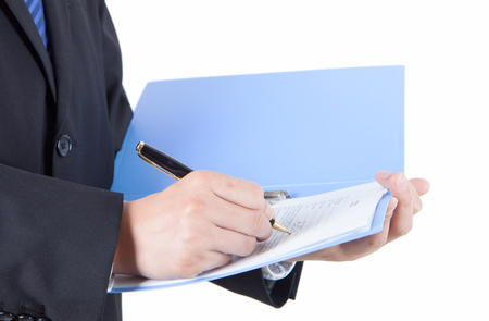 Business men signing documentsのeditorial素材