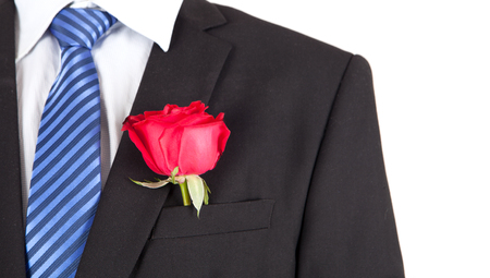 Rose in a suit pocketの写真素材