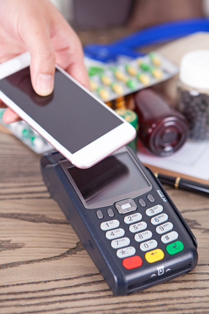 Mobile phone payment for medicineの写真素材
