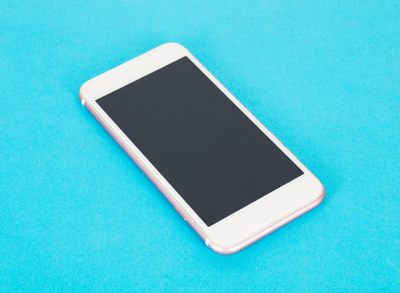 Mobile phone on blue background