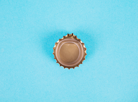 Bottle cap on blue backgroundの写真素材