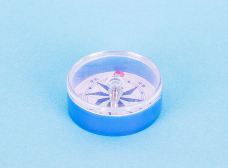 Compass on blue backgroundの写真素材