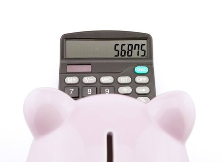 Piggy bank and calculatorの写真素材