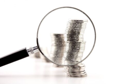 financial concept,, Coins under magnifying glassの写真素材