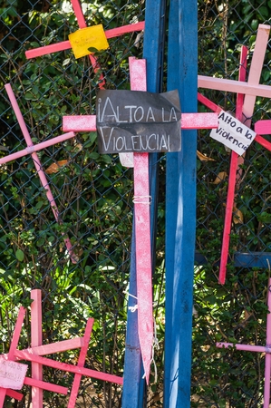 Reforma Avenue, Mexico City - March 25, 2018. Assembly carried out mainly by women on Reforma Avenue and The Angel of Independence where they placed thousands of wooden crosses in pink with various messages as a protest against of feminicide and insecuritのeditorial素材