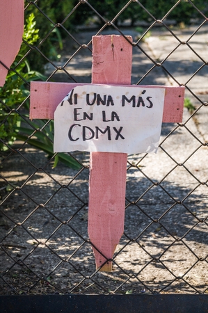 Reforma Avenue, Mexico City - March 25, 2018. Assembly carried out mainly by women on Reforma Avenue and The Angel of Independence where they placed thousands of wooden crosses in pink with various messages as a protest against of feminicide and insecuritのeditorial素材