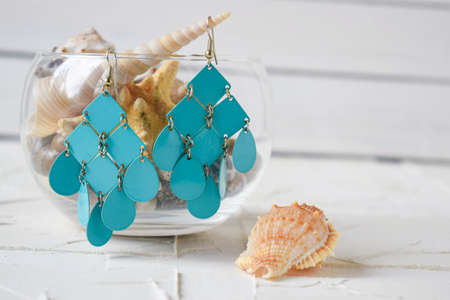 turquoise earrings in a marine themeの写真素材