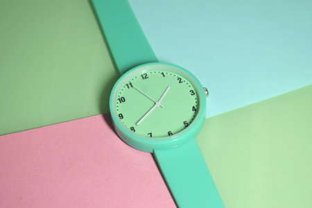 green watch with rubber strap. color backgroundの写真素材