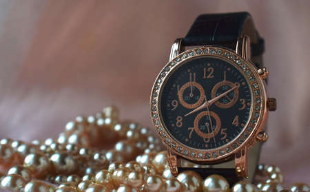 women's wristwatch with a black belt. pearlsの写真素材