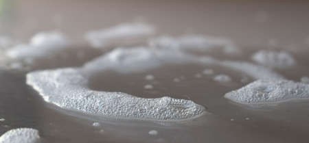 soap foam with soap bubbles. a means of hand cleanliness. the concept of protection and health