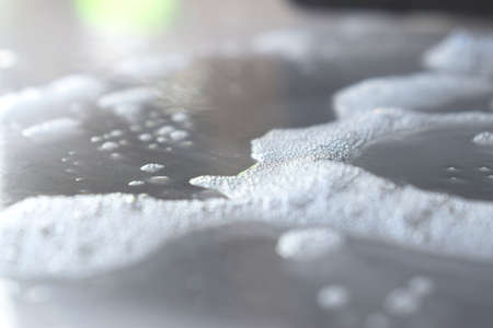 the concept of a background of soap foam and many small soap bubbles.cleanliness and health