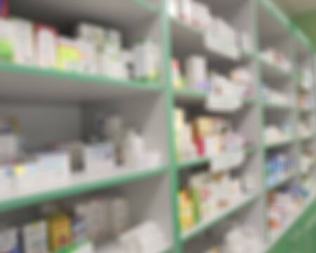 cabinets and shelves with medicines in a pharmacy. blurryの写真素材
