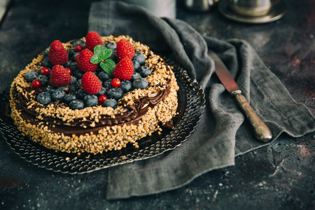 Tasty chocolate cake with different berriesの写真素材