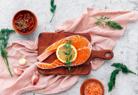 Salmon with lemon and pepper. Top view の写真素材