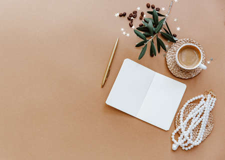 Stylish Female background with cup of coffee, necklace and blank note. Ideas, notes or plan writing...
