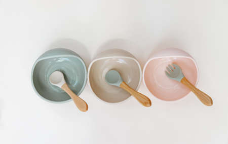 Set of silicone dishware for baby. First baby food concept, serving food for kids