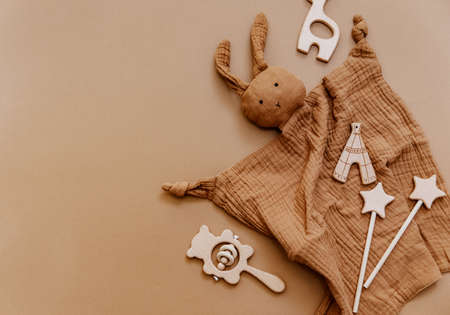 Baby toys on brown background. Minimal kids conceptの写真素材