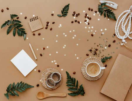 Stylish background with cup of coffee, calendar and notes on brown. Ideas, notes or plan writing...