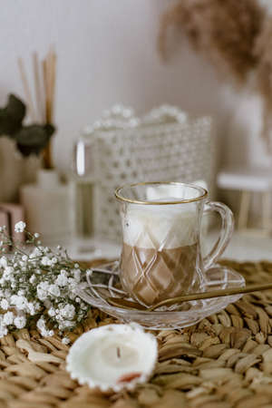 Coffee cup cappuccino, candles, still life concept, cozy feminine stationery. Hygge moodの写真素材