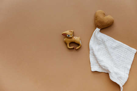 Set of baby stuff and accessories for newborn on brown background. Baby shower or baby care concept. Flat lay, top viewの写真素材