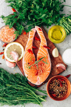 Fresh Salmon.Raw Salmon Red Fish Steak with herbs.の写真素材