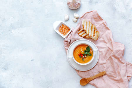 Cold tomato soup gazpacho in a bowl, Spanish traditional summer food.の写真素材