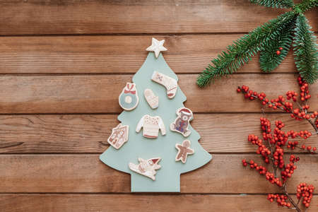 Christmas tree made of wood over wooden background, copy space, xmas and new year symbol, decoration. Christmas toyの写真素材