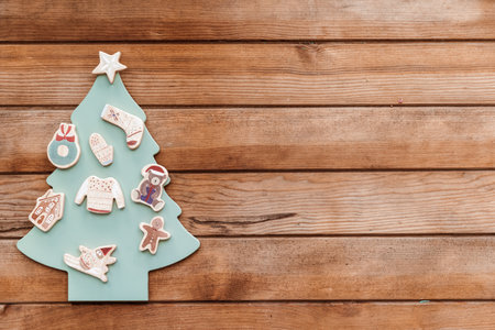 Christmas tree made of wood over wooden background, copy space, xmas and new year symbol, decoration. Christmas toyの写真素材