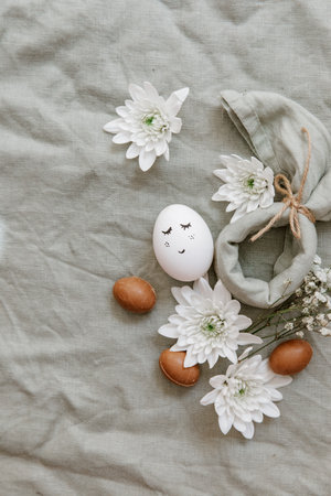 Easter eggs on a linen background. Easter background. Copyspace. Easter eggs flat lay on rustic...