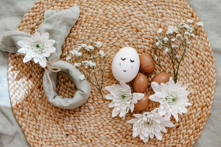 Easter eggs on a linen background. Easter background. Copyspace. Easter eggs flat lay on rustic table. easter ideasの写真素材