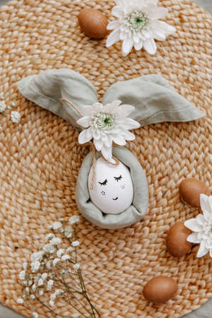 Easter eggs on a linen background. Easter background. Copyspace. Easter eggs flat lay on rustic table. easter ideasの写真素材