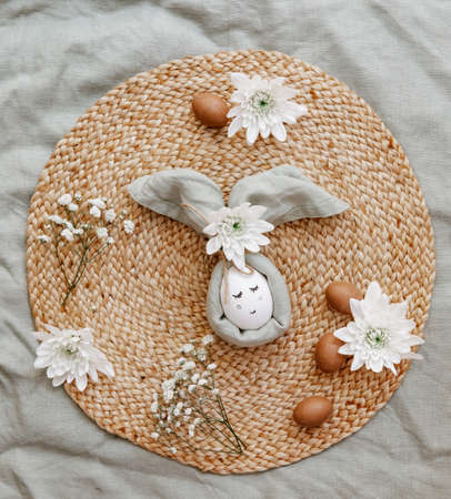Easter eggs on a linen background. Easter background. Copyspace. Easter eggs flat lay on rustic table. easter ideasの写真素材