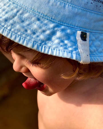 attractive boy of three years old smiling with teeth with looking at the camera, joy. happy...