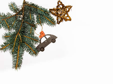 layout white background blue spruce branch Christmas toys balls machine with gifts star from the gotangの写真素材