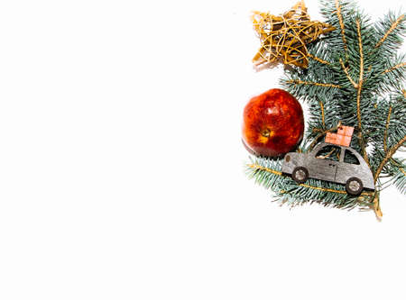 layout white background blue spruce branch Christmas toys balls machine with gifts star from the gotangの写真素材